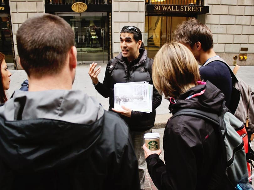 Wall Street tour guide with small group