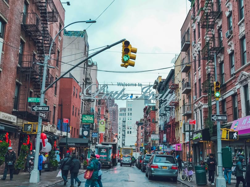 People walking by Little Italy in NYC