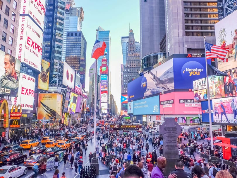 Crowded Times Square in the day time in NYC